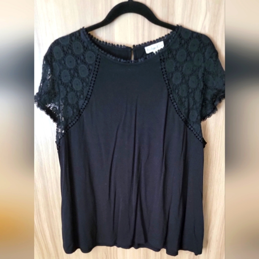 Black top with sheer sleeves